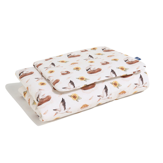 Kids bedding set with stork and sunflower pattern, side view