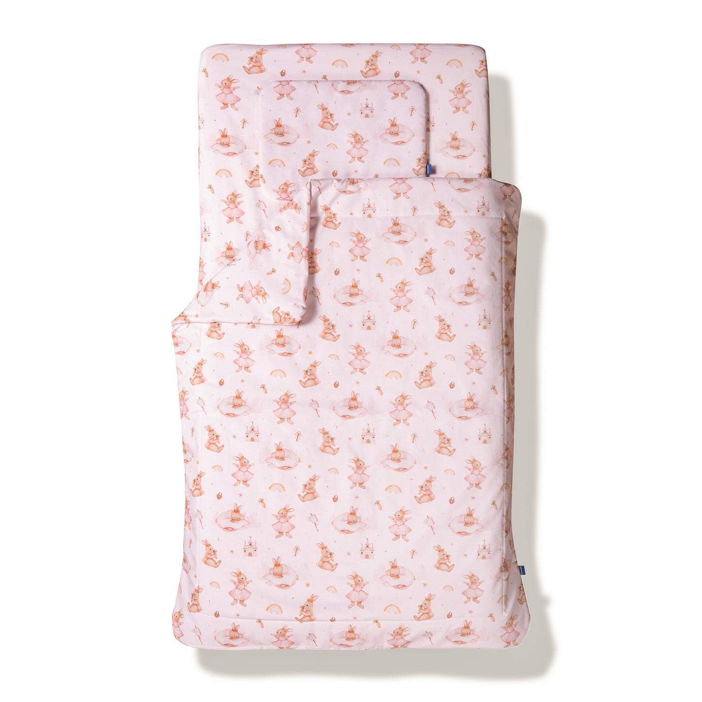 Baby bedding set with bunny prints and a branch on the side