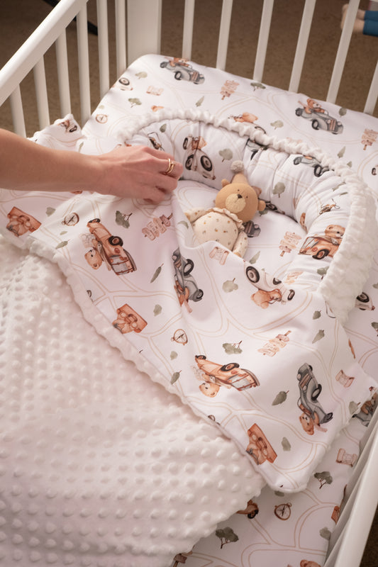 Soft and cozy baby blanket with teddy bear and car-themed prints. Perfect for keeping your baby warm and comfortable