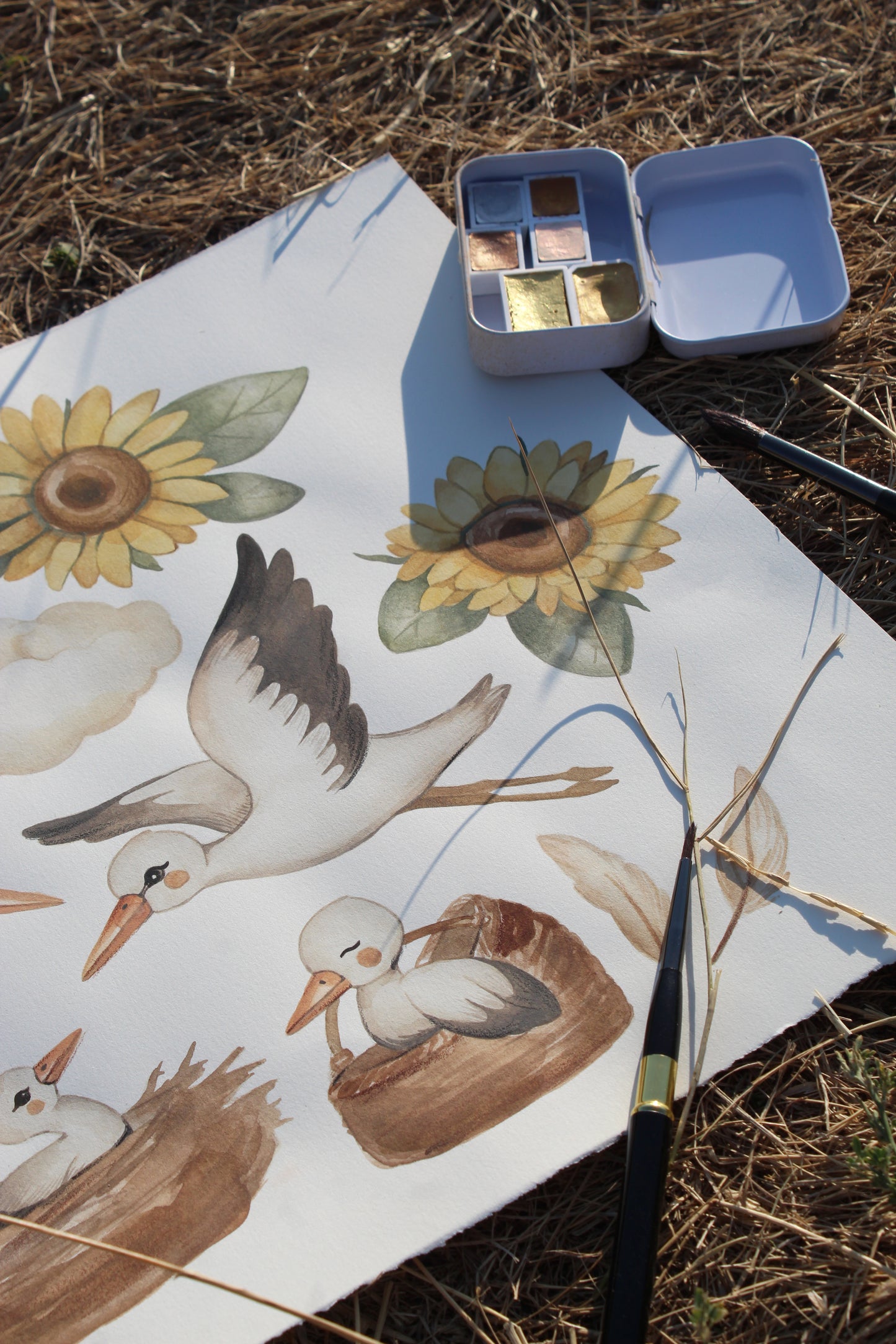 Hand-painted pattern creation process for MyUkraine designs, featuring storks, sunflowers, and traditional Ukrainian elements