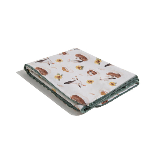 Baby blanket with sunflowers and storks print, soft green backing, My Ukraine collection