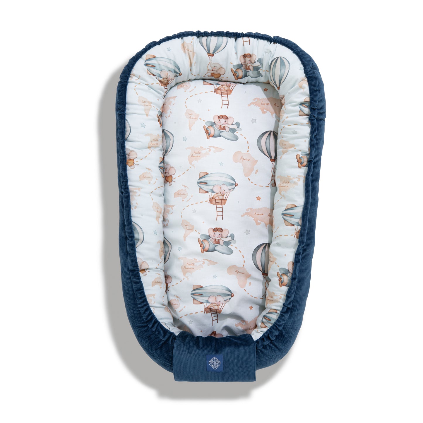 Baby cocoon from the Sky Dreamer collection featuring hot air balloons and teddy bears on a light blue background