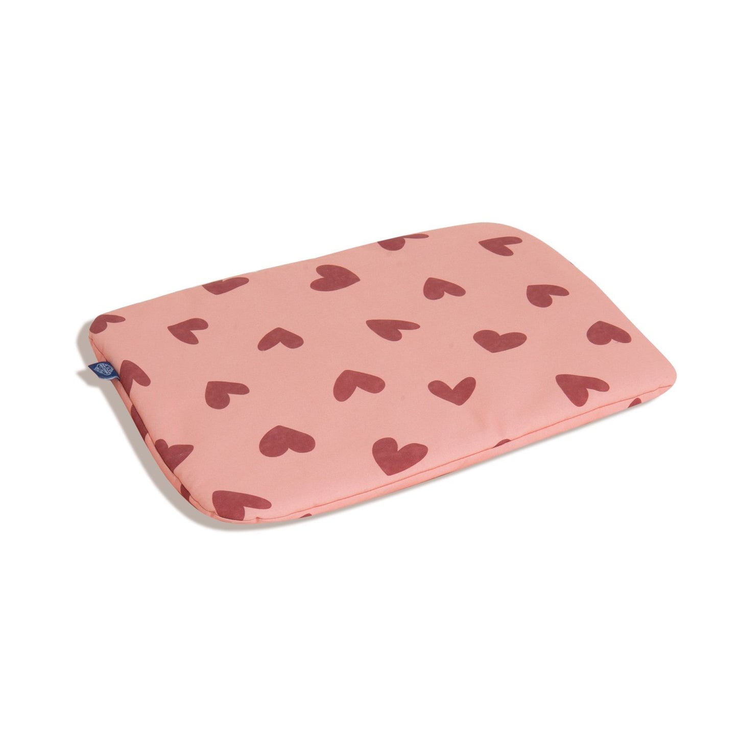 Children’s bedding pillow in Heartland design, showcasing red heart patterns on a pink fabric, providing comfort and style for kids