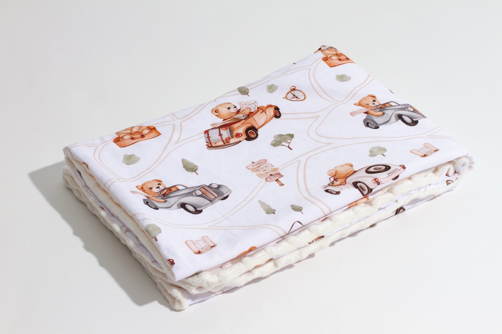 Soft and cozy baby blanket with teddy bear and car-themed prints. Perfect for keeping your baby warm and comfortable